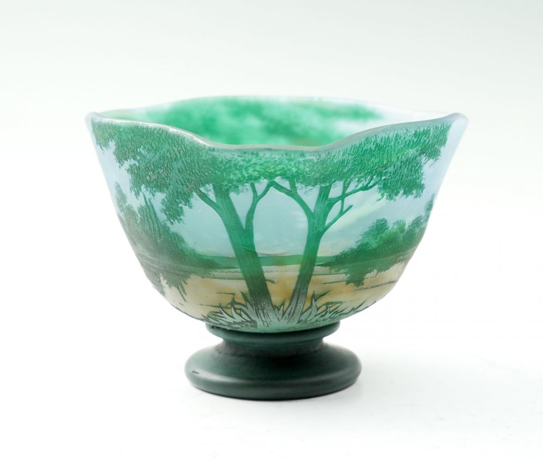 DAUM NANCY SPRING SCENE ART GLASS BOWL: DAUM NANCY SPRING SCENE ART GLASS BOWL: Daum Nancy cameo art glass bowl having a vibrant lush green lake scene. Signed in cameo. Approx. 5" h x 7" w.