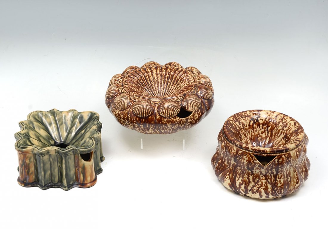 3 BENNINGTON? POTTERY SPITTOONS: 3 BENNINGTON? POTTERY SPITTOONS: Comprising 1- spatterware spittoon having an encompassing shell design, 1- spatterware spittoon having a pinched & incised "X" design, & 1- rectangular spittoon having