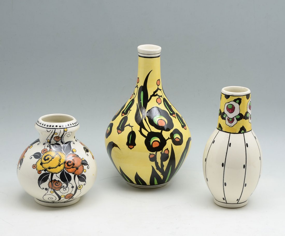 3 PC. BOCH FRERES FLORAL MOTIF VASES: 3 PC. BOCH FRERES FLORAL MOTIF VASES: Comprising;1- Yellow ground vase with floral & foliate design, 1- having a white ground with vertical black lines & dashes with a yellow ground floral designed ne