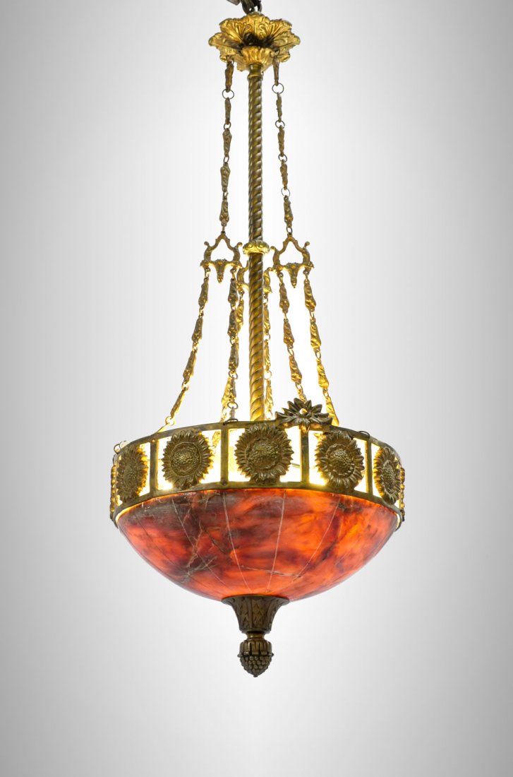 BRASS & ALABASTER LIGHT FIXTURE: BRASS & ALABASTER LIGHT FIXTURE: 3 light hall fixture having brass foliate designed chain links, alabaster shade having an encompassing sunflower medallion design. Approx. 33" h x 13.5" w.
