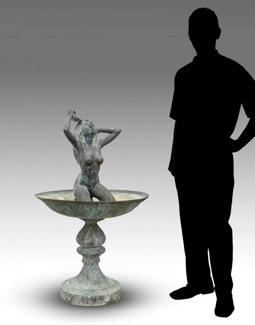 NUDE MAIDEN FOUNTAIN: NUDE MAIDEN FOUNTAIN: Nude bathing beauty with shell in right hand, that water comes out. Pump resides between her and pedestal base reservoir. Approx. 50" h x 30.5" w.