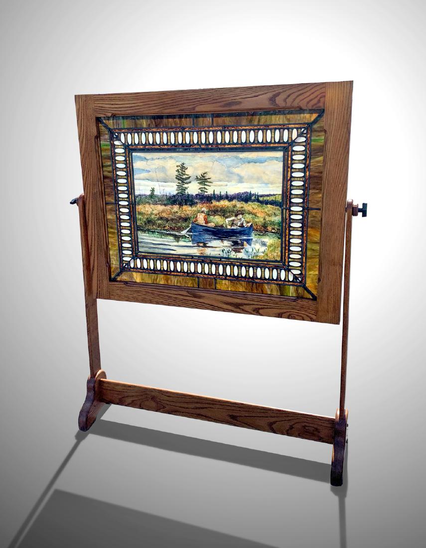 STAINED GLASS WINDOW WITH PAINTING BY JAMES AGNEW MYERS: STAINED GLASS WINDOW WITH PAINTING BY JAMES AGNEW MYERS: Stained glass window having a central painting, "The Blue Boat", after Winslow Homer, by James Agnew Meyers. Resides in an oak frame & stand. A