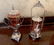 2 PIECE MARY GREGORY GLASS COVERED JARS - 6