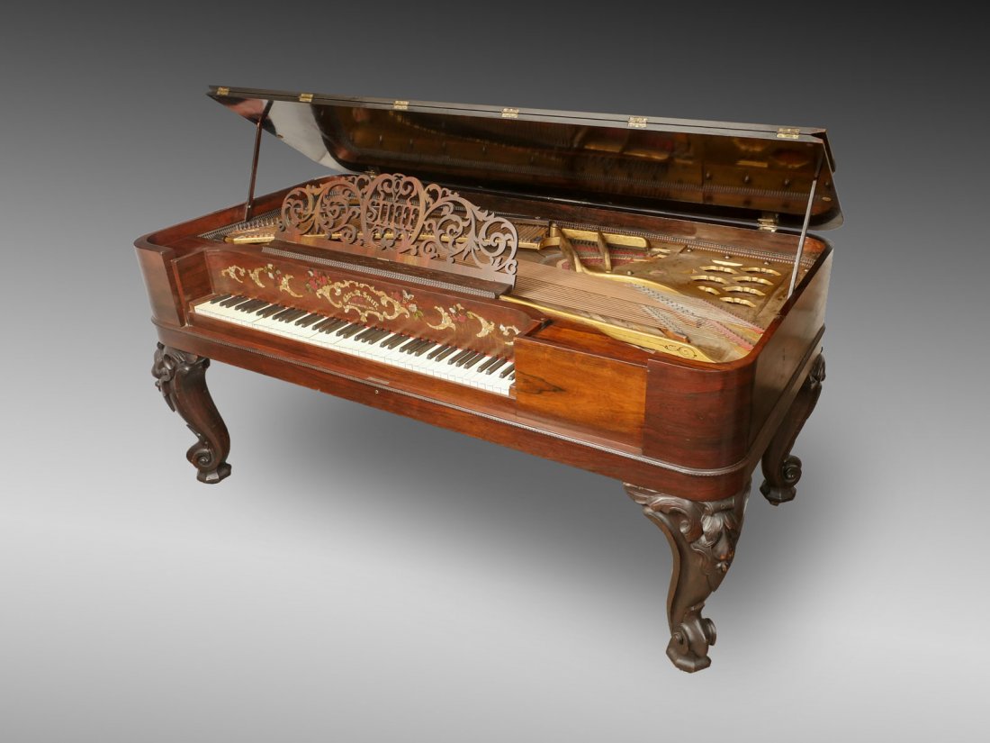 CHAS. M. STIEFF MAHOGANY SQUARE GRAND PIANO: CHAS. M. STIEFF MAHOGANY SQUARE GRAND PIANO: Chas. M. Stieff piano dated 1868 having a floral & scrolling foliate inlay above the keys, raised on scrolling cabriole legs. Museum deaccession. Approx. 3