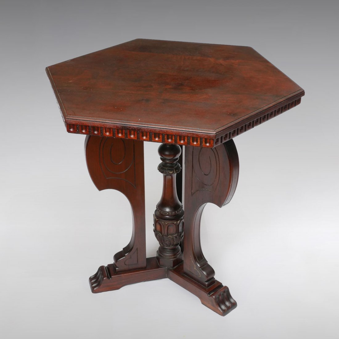KITTENGER SPANISH STYLE TABLE: KITTENGER SPANISH STYLE TABLE: 1920's Kittinger Spanish style table having an encompassing dentil moulding design Raised on legs with an incised scrolling design with a turned & carved foliate central
