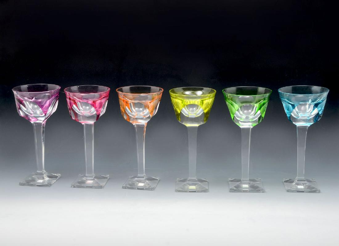 6 PIECE MOSER STEMWARE SET: 6 PIECE MOSER STEMWARE SET: Comprising 6 uniquely colored Moser wine glasses raised on tapered square stem. Underside bares an etched Moser mark. Approx. 7.5'' h x 3.5'' w.