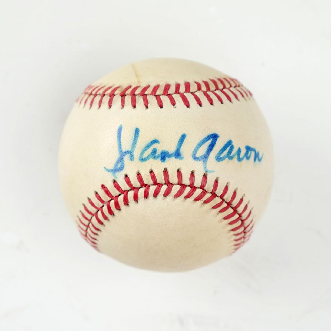AUTHENTIC AUTOGRAPHED HANK AARON BASEBALL: AUTHENTIC AUTOGRAPHED HANK AARON BASEBALL, AUTHENTIC AUTOGRAPHED PETE ROSE BASEBALL, Official national League Signed Dwight Gooden baseball in Display Container.