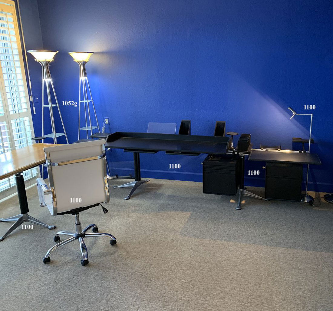 HERMAN MILLER BRUCE BURDICK GROUP MODULAR DESK SET: HERMAN MILLER BRUCE BURDICK GROUP MODULAR DESK GROUP WITH CHAIR: To include 2 black desks, 2 modular file cabinets, two I-Beam mounting rails, light wood writing surface/ desk, 3 pedestals, and Herman
