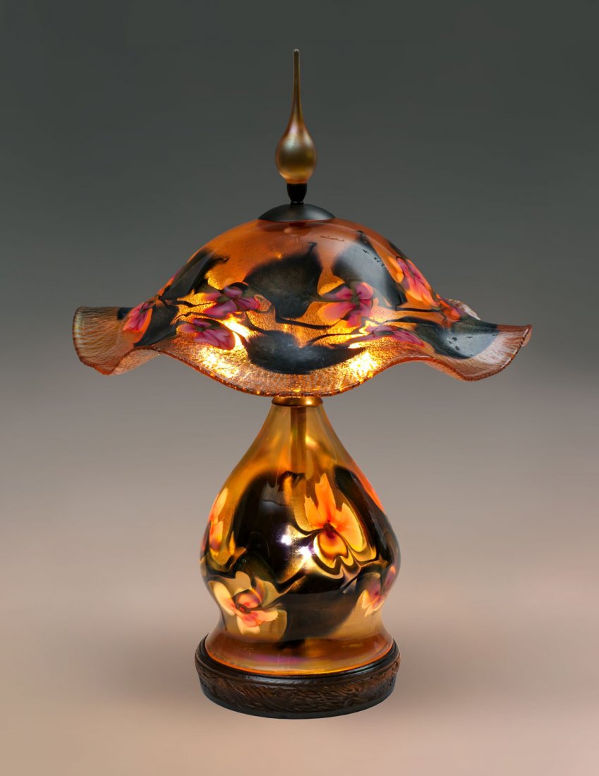 LARGE CHARLES LOTTON IRIDESCENT MULTI-FLORA LAMP: LARGE CHARLES LOTTON IRIDESCENT MULTI-FLORA LAMP: Large art glass 4 light lamp by Charles Lotton, having colorful iridescent body with encompassing flowers. Shade has the same design but has a crackle