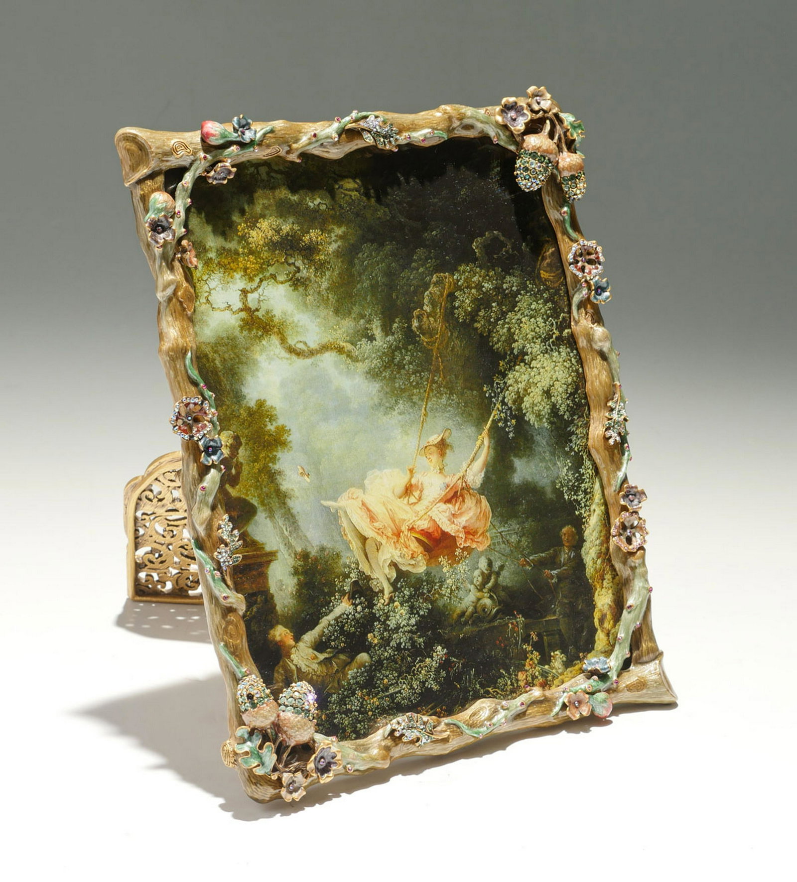 JAY STRONGWATER FLORAL VINE PICTURE FRAME: JAY STRONGWATER FLORAL VINE PICTURE FRAME: Enameled & jeweled frame by Jay Strongwater having an overall Oak log frame with blossoming vines & foliate with acorns at 2 corners. Verso has a swirling ta