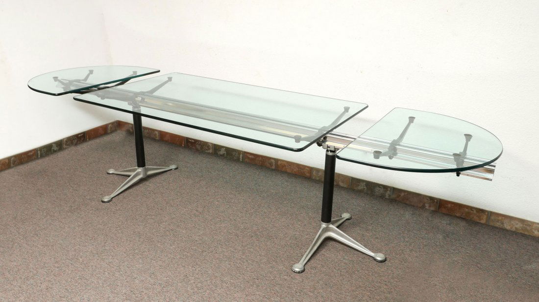 BRUCE BURDICK HERMAN MILLER OVAL GLASS TOP DESK: BRUCE BURDICK HERMAN MILLER OVAL GLASS TOP DESK: To include a rectangular glass center panel, 2 half round end panels, long I Beam bar support, and 2 stanchion legs. Found on the web at www.yliving.co