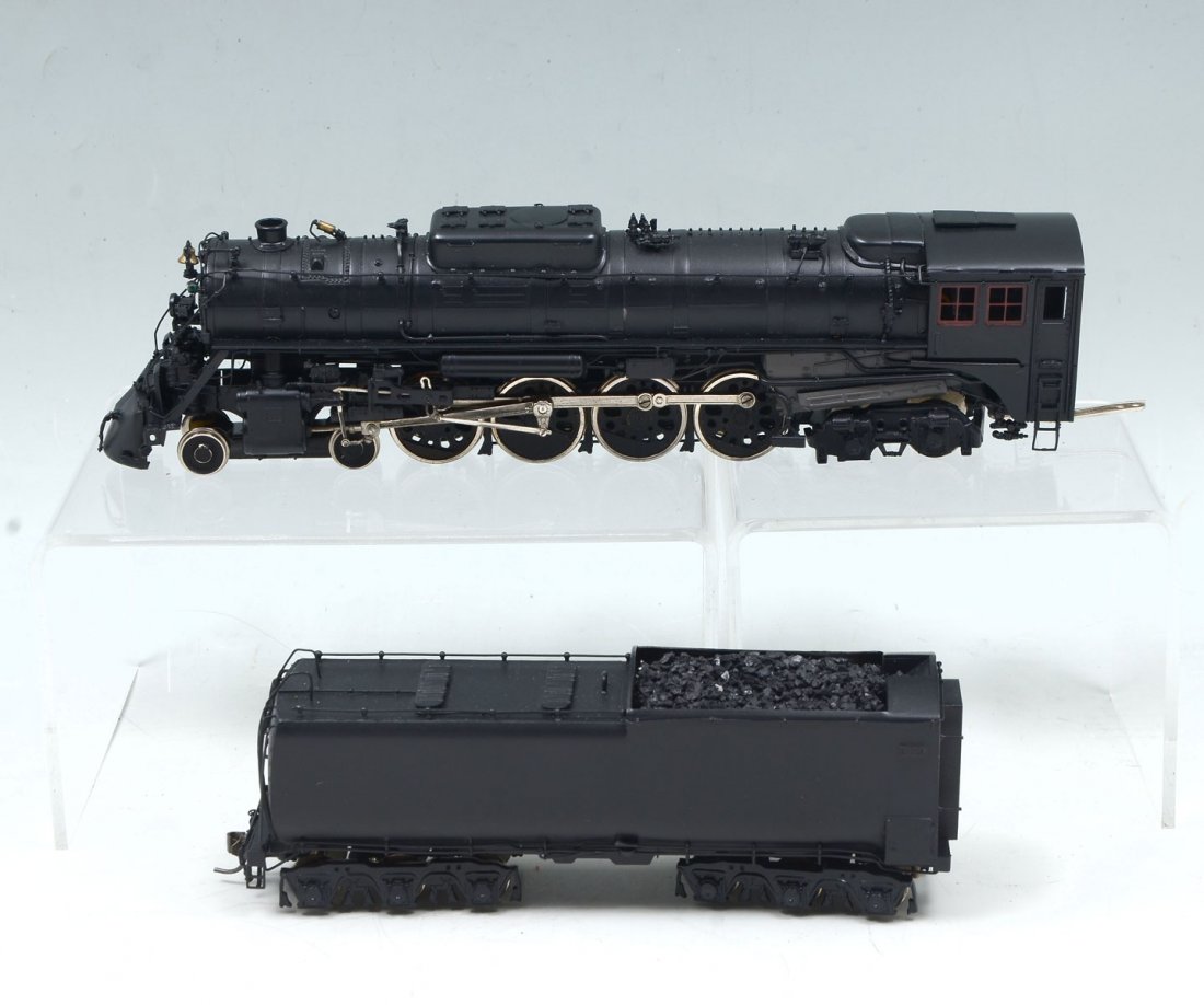 OVERLAND/DONG JIN MILWAUKEE S-3 ENGINE & TENDER: OVERLAND/DONG JIN MILWAUKEE S-3 ENGINE & TENDER: Black & grey with maroon accented Overland/ Dong Jin "The Milwaukee Road" S-3 4-8-4 model train Engine & Tender in original box. Approx. 2.75" h x 11.7
