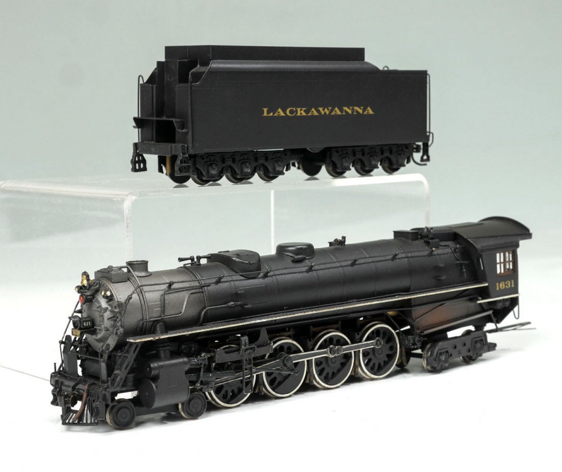 NICKEL PLATE/KMT DELAWARE, LACKAWANNA, & WESTERN Q4: NICKEL PLATE/KMT DELAWARE, LACKAWANNA, & WESTERN Q4 ENGINE & TENDER: Black & grey Delaware, Lakawanna, & Western Q4 4-8-4 Pocono model train Engine & Tender #1631, by Nickel Plate for KMT, 1975. In or