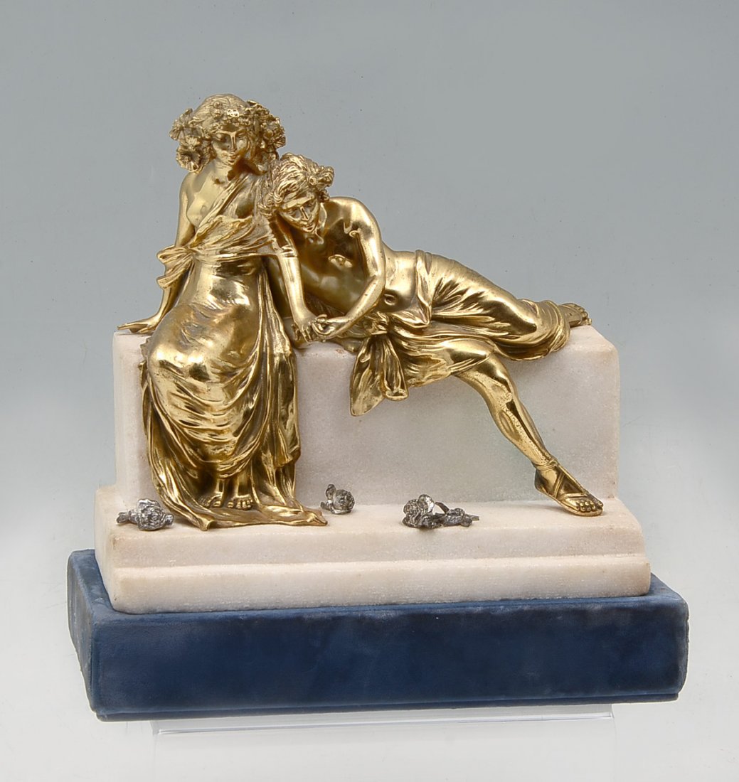 CARL KAUBA BRONZE GROUPING: KAUBA, Carl, (Austria, 1865-1992): 2 Figures Resting on Top of a Marble Plinth, Overall Measures 9" x 9.5" x 4". Incised signature in marble C. Kauba fecit, stamped verso geschutz. Rests on velvet uph