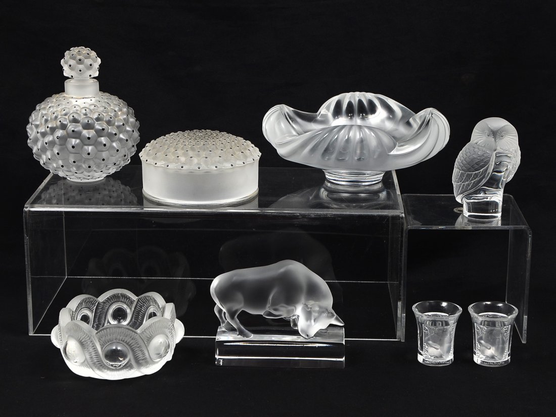 8 PIECE LALIQUE COLLECTION: 8 PIECE LALIQUE COLLECTION: Comprising; 2- Trinket dishes, 2 shot glasses, 1- Lidded powder jar, 1- Perfume bottle, 1- owl figure, & 1- Bull. Largest Approx. 4.75" h x 4" w.