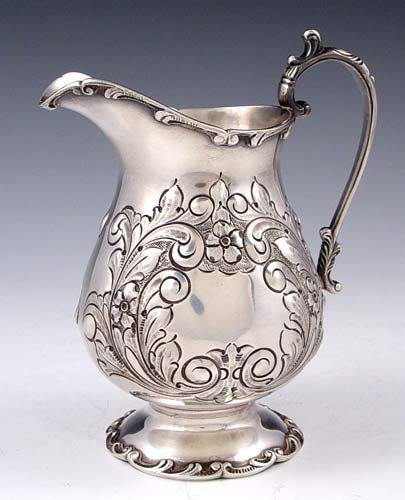 6 PIECE HAND CHASED STERLING TEA SERVICE - 7