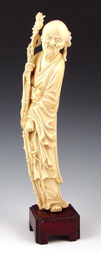 CHINESE CARVED IVORY FIGURE
