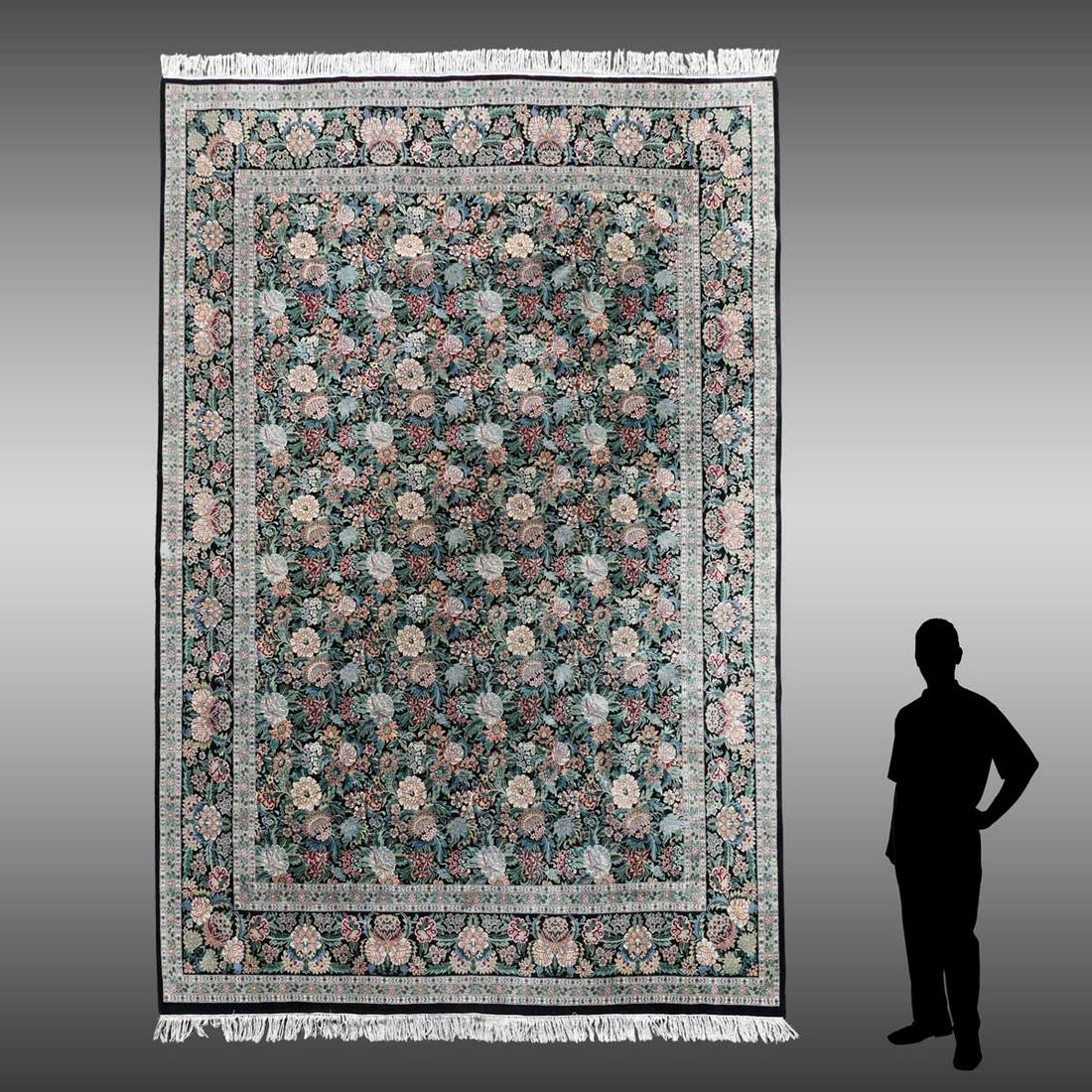 PAKISTANI-PERSIAN HK WOOL RUG, 9: PAKISTANI-PERSIAN HAND KNOTTED WOOL RUG, 9' x 12'': The black field of this rug is covered with a lovely floral design that is carried into the main border.