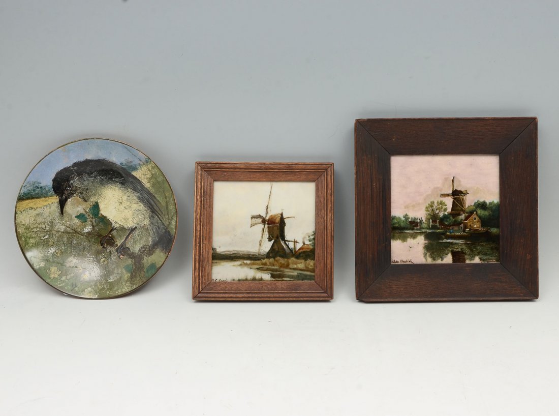 3 PC. ROZENBURG, 2 PLAQUES, & 1 BIRD PLATE: 3 PC. ROZENBURG, 2 PLAQUES, & 1 BIRD PLATE: Comprising; 2- hand-painted framed plaques, having Dutch windmill scenes. Both signed. 1- Hand-painted bird perched on a branch in a field. All 3 bare The R
