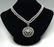DIAMOND PENDANT ON MIKIMOTO PEARL NECKLACE