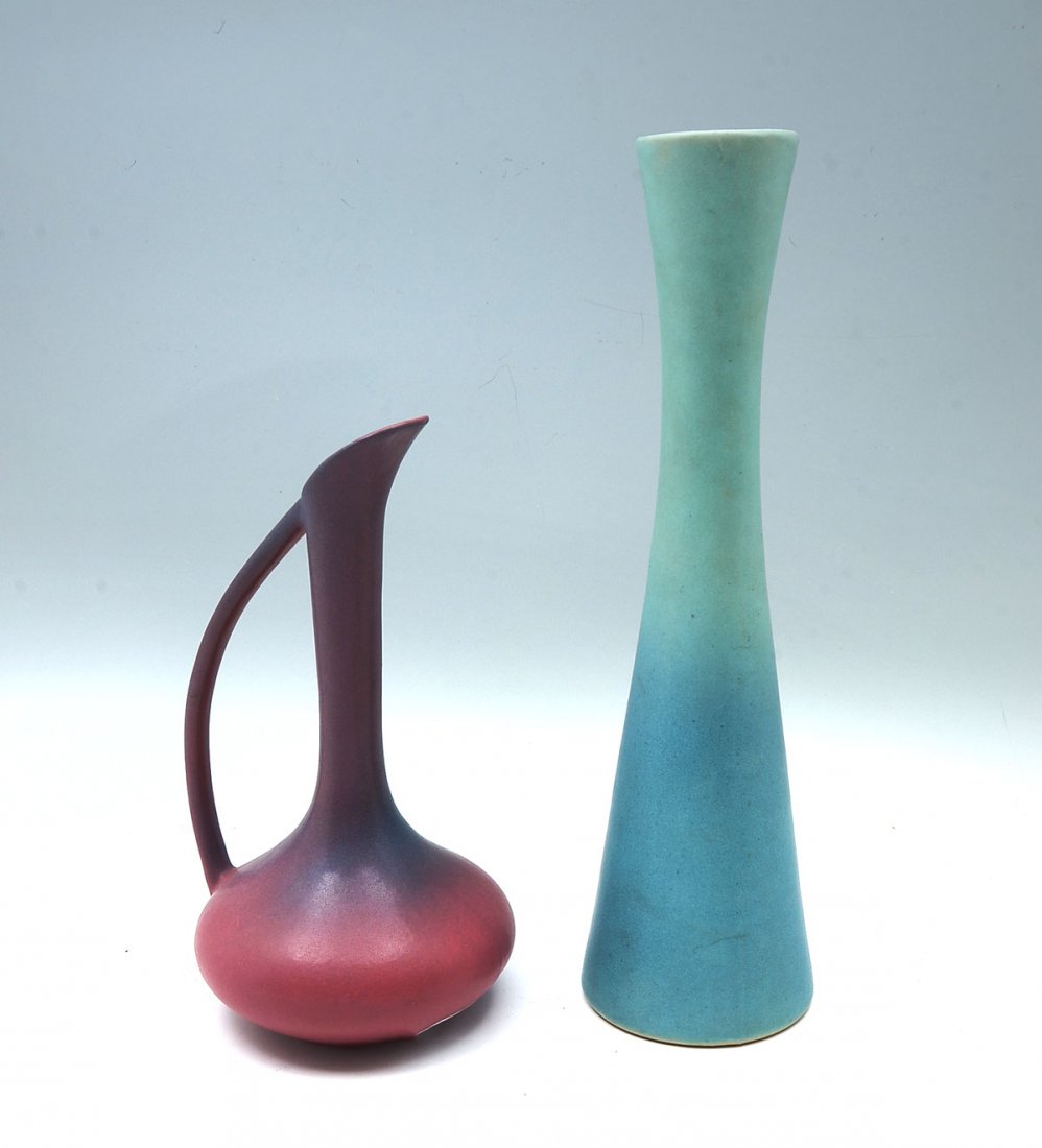 2 PC. VAN BRIGGLE EWER AND VASE: 2 PC. VAN BRIGGLE EWER AND VASE: Comprising; 1- Sea Foam ground vase with blue spray. Incised signature & marks at underside. Approx. 15.75" h x 4.25" w. 1- Mulberry ground Ewer with blue spray. Incis
