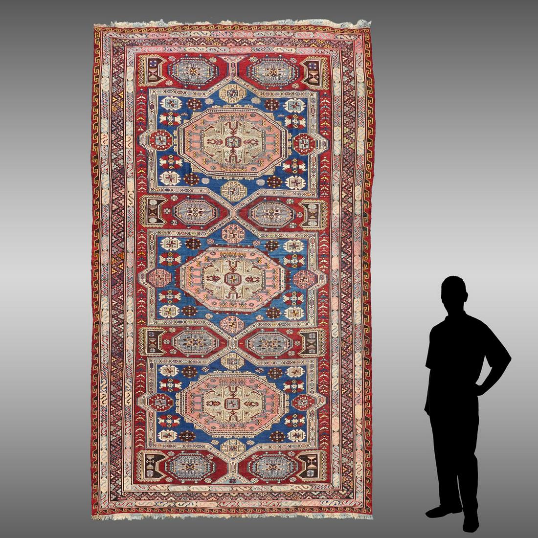 PERSIAN SHAH SEVAN SOUMAK HAND WOVEN WOOL FLATWEAV: SEMI-ANTIQUE PERSIAN SHAH SEVAN SOUMAK HAND WOVEN WOOL FLATWEAVE RUG, 6'10'' X 11'8'': This rug has a good design of alternating panels and medallions in rust, ivory, peach, and blue that go down the 