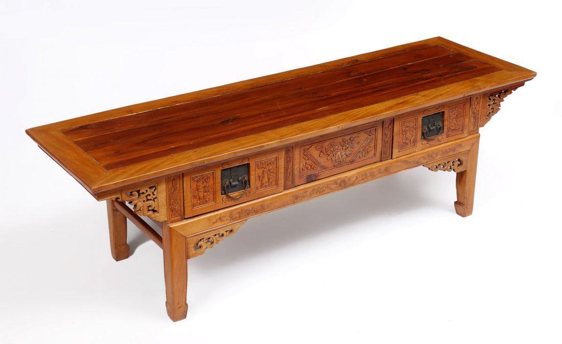 CHINESE ALTAR TABLE: CHINESE ALTAR TABLE: Chinese altar table, having an overall carved scrolling, floral vase, & blossoming foliate design. Central drawer at one side, and 2 outer drawers at opposing side. Metal drop han