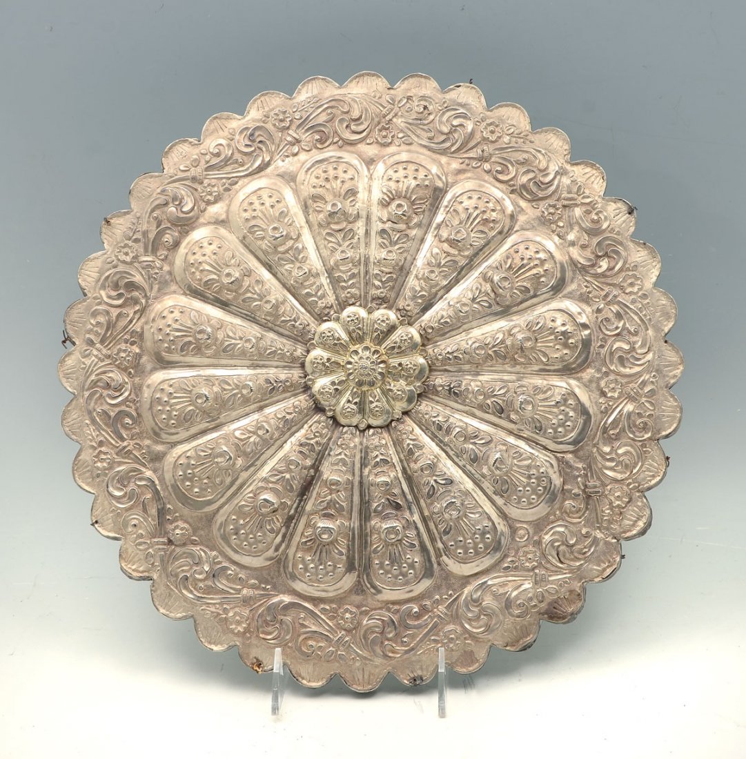 TURKISH OTTOMAN EMPIRE SILVER MIRROR: TURKISH OTTOMAN EMPIRE SILVER MIRROR: Turkish Ottoman Empire mirror cased in .800 -.900 Silver, having an overall raised floral design and scrolling border. Impressed Tughra mark of the Sultan & stand