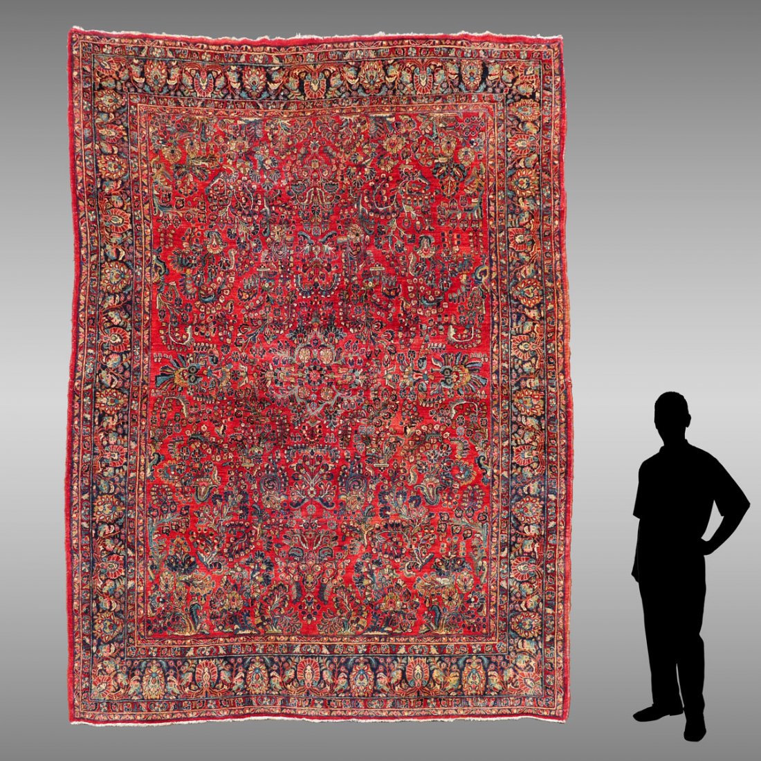 SEMI-ANTIQUE PERSIAN SAROUK HK WOOL RUG, 8: SEMI-ANTIQUE PERSIAN SAROUK HAND KNOTTED WOOL RUG, 8'9'' X 11'8'': This is a beautiful example of a Sarouk with a traditional design of sprays of flowers on a salmon red field. Provenance: Fred S. and