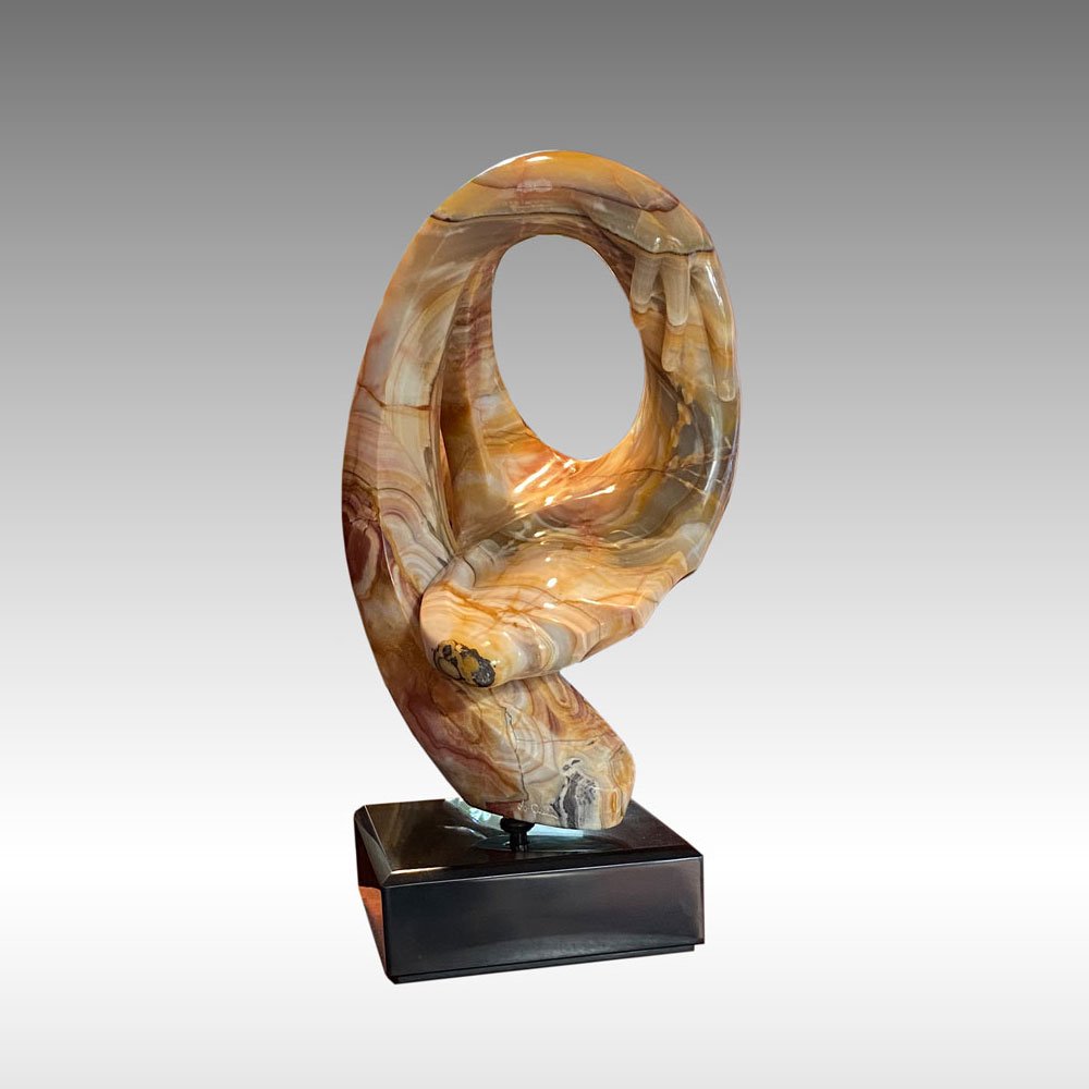 ANTHONY QUINN ABSTRACT MARBLE SCULPTURE: QUINN, Anthony, (Mexican, 1915-2001): Abstract Composition with Face and Arms Outstretched, height 20.5", signed on the base, sits on a beveled black marble plinth, 23.5" in height overall, comes with