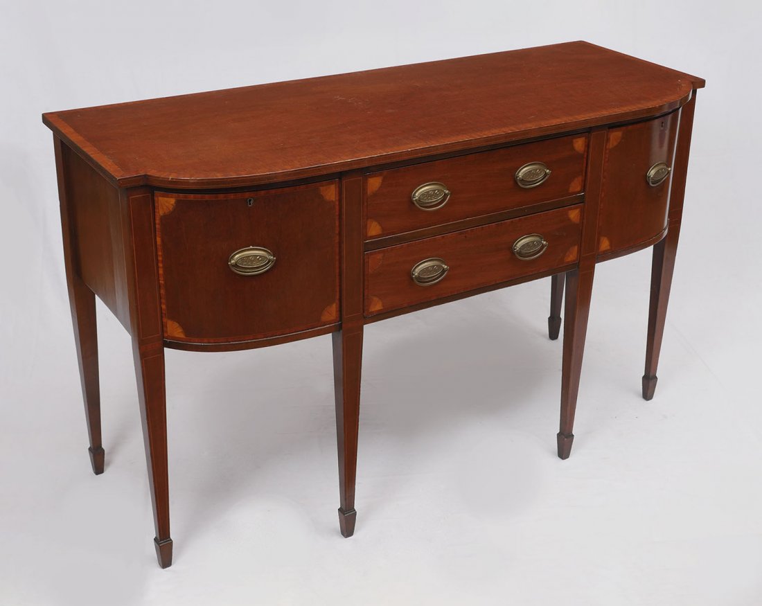 19TH C HEPPLEWHITE CENTENNIAL BANDED MAHOGANY SIDEBOARD: 19TH C HEPPLEWHITE CENTENNIAL BANDED MAHOGANY SIDEBOARD: 2 door, 2 drawer case raised on six tapered legs ending in spade feet. Each door and drawer adorned with inlaid fan motif pantera and string in