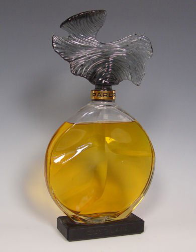 GUERLAIN FACTICE PERFUME DISPLAY BOTTLE PARURE: GUERLAIN FACTICE PERFUME DISPLAY BOTTLE - PARURE: 16 1/2" high x 8 1/2" at widest point. Note interior water ring inside glass at neck. The stopper is reported to have never been removed and we will n