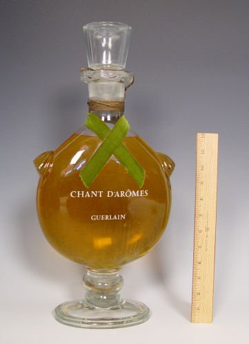 GUERLAIN FACTICE PERFUME CHANT D'AROMES: GUERLAIN FACTICE PERFUME DISPLAY BOTTLE - CHANT D' AROMES: Measures 18 1/2'' high x 9'' at widest point.