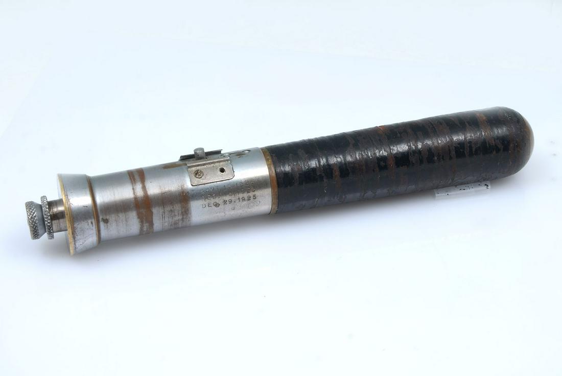 TEAR GAS BILLY CLUB: TEAR GAS BILLY CLUB: Federal Laboratories Inc. tear gas billy club, having the barrel wrapped in leather rings. In order to be fired, the knob needs to be pulled back until a click is heard. Trigger b