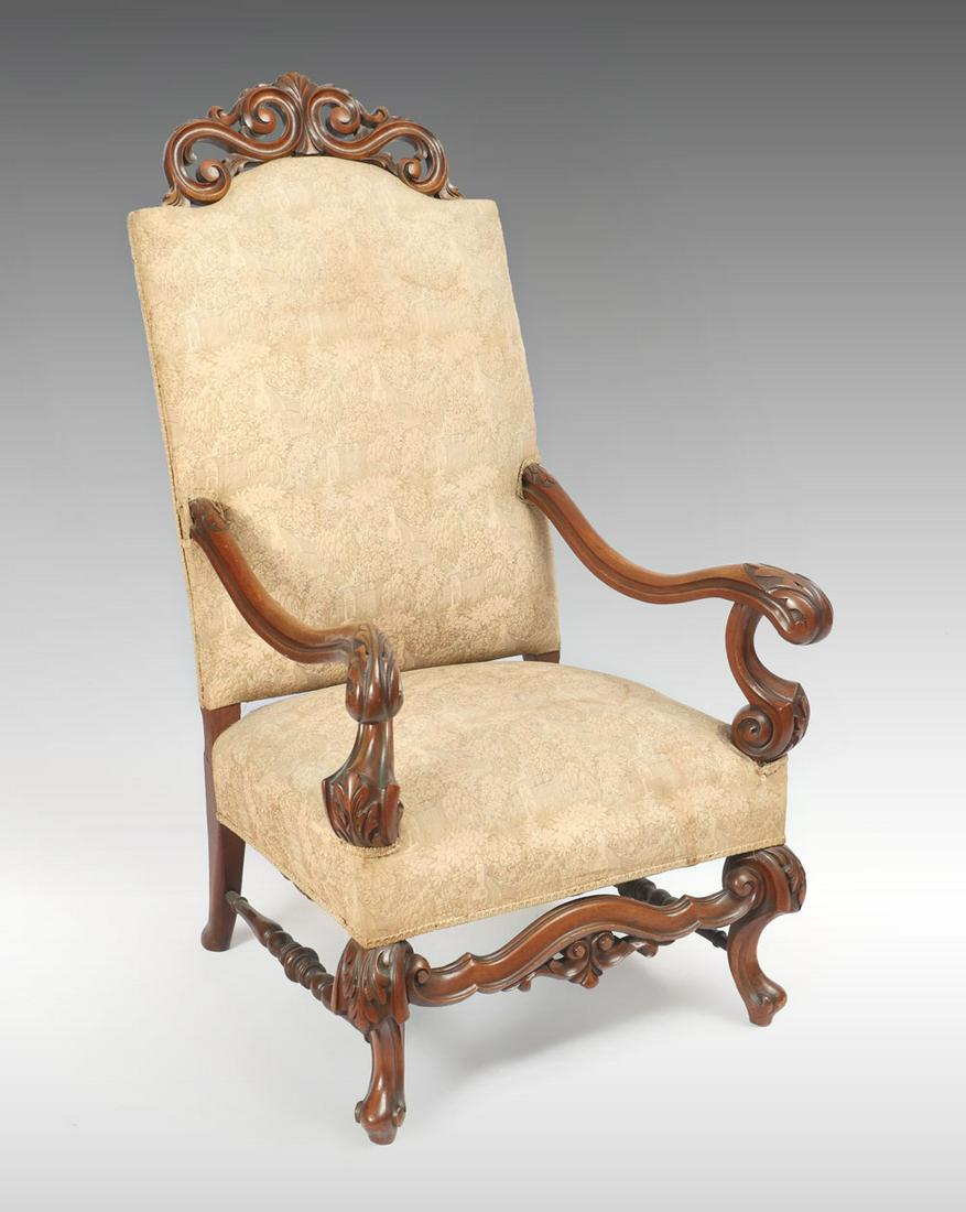 HIGHLY CARVED ARMCHAIR: HIGHLY CARVED ARMCHAIR: Highly carved Walnut armchair having an overall Scrolling Acanthus design. Church amongst foliate motif upholstery. Shaped crotch raised on front cabriole legs. Approx. 49.5'' 