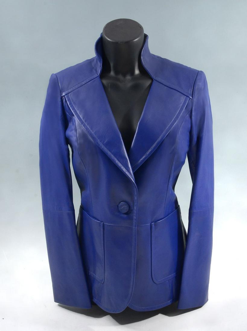 NEVER WORN PEACOCK LEATHER ST. JOHN JACKET: NEVER WORN PEACOCK LEATHER ST. JOHN JACKET: Another luxurious peacock (royal blue) jacket by St John with tags still on it. Single matching color button closure, 2 front pockets, and matching lining. 