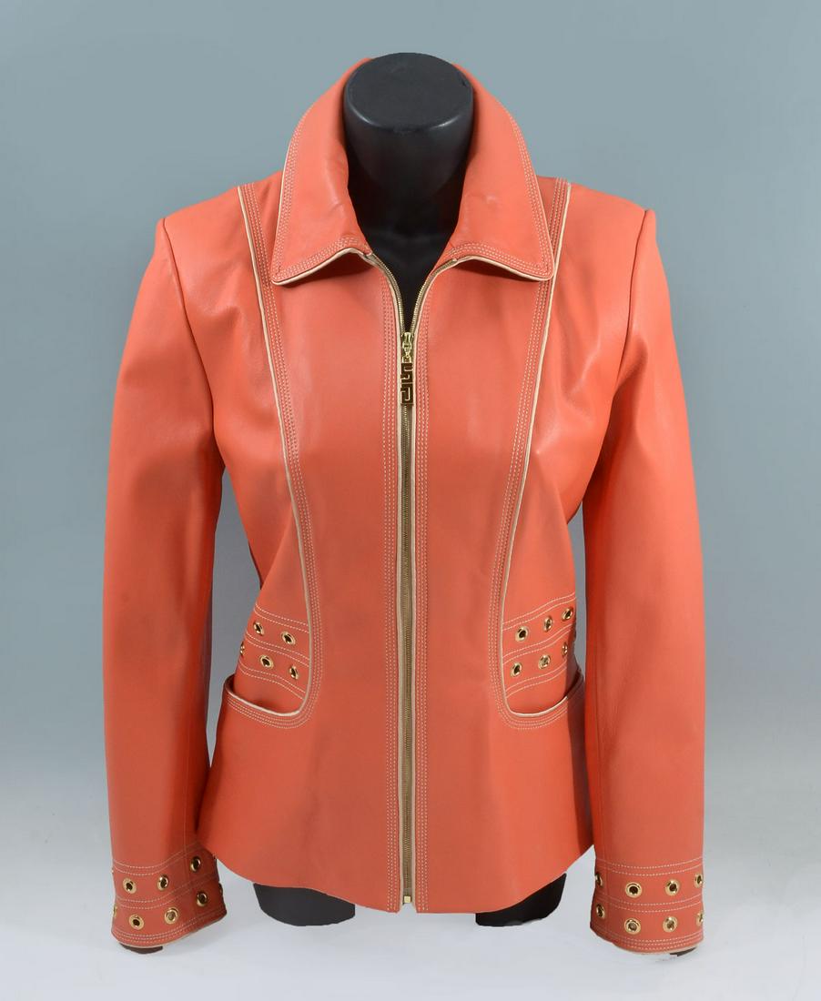 BRAND NEW MELON COLOR ST JOHN LEATHER JACKET: BRAND NEW MELON COLOR ST JOHN LEATHER JACKET: This is my personal favorite jacket. So very stylish with triple stitching beside the zipper, on the cuffs, at the collar and next to the off white leathe