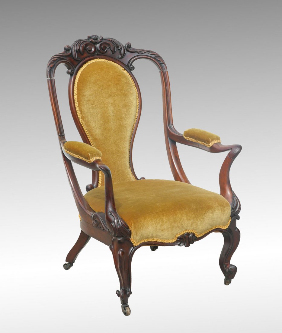 STYLISH VINTAGE 19TH C VICTORIAN ARMCHAIR: STYLISH VINTAGE 19TH C VICTORIAN ARMCHAIR: Shaped back splat under a richly carved scrolling floral carved crest rail. Approx. 39.75" h x 25.5" l x 33" w.