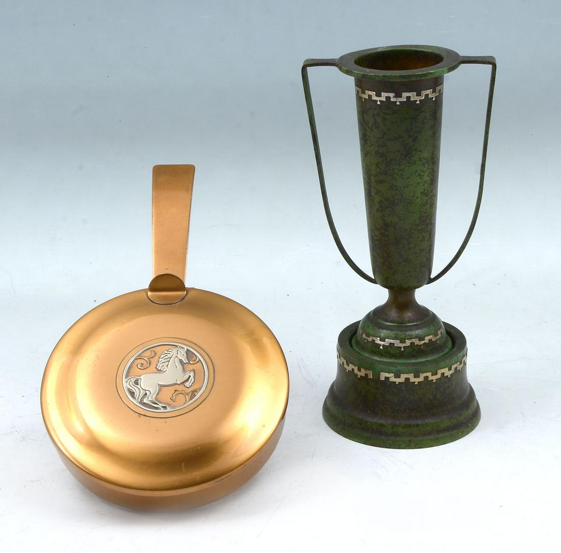 2 PC. SILVERCREST & HEINTZ STERLING ON BRONZE: 2 PC. SILVERCREST & HEINTZ STERLING ON BRONZE: Comprising; 1- Heintz Art Metal Shop trophy form patinated bronze on stand, having Sterling overlayed accenting. Impressed mark at underside. 1- Silvercr