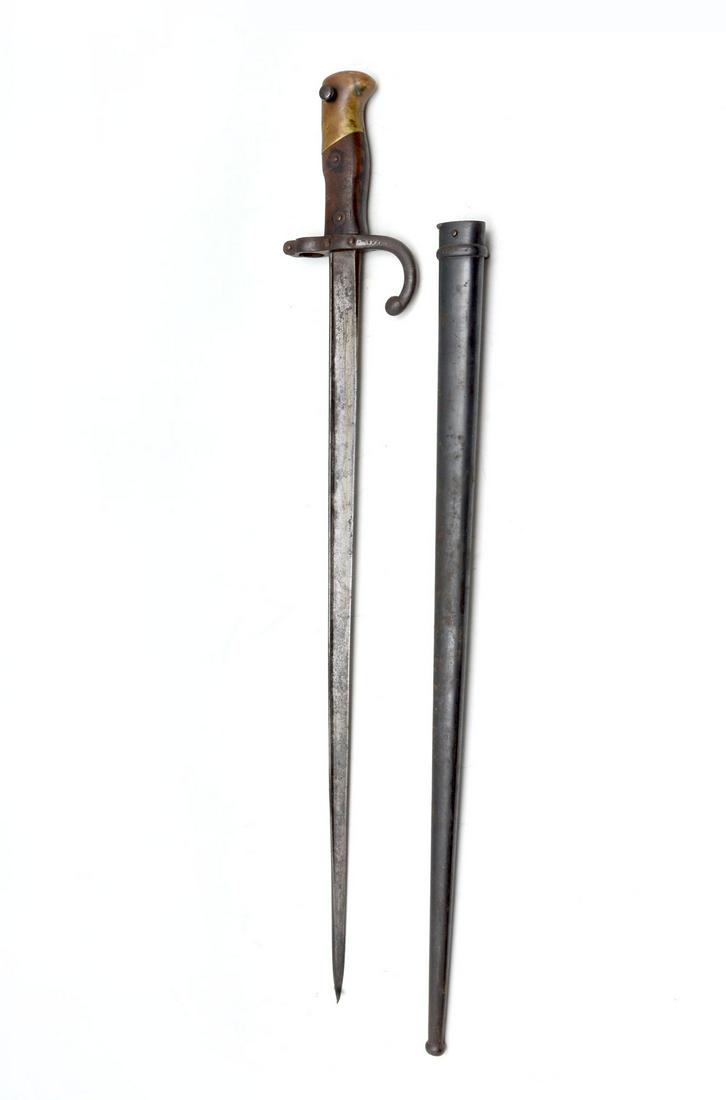 FRENCH M1874 GRAS BAYONET: FRENCH M1874 GRAS BAYONET: "T" form French bayonet, Impressed B1281, Scabbard bears an impressed "F" 20744. Inscribed blade. St. Etiene 1879. Approx. 25.75" l.