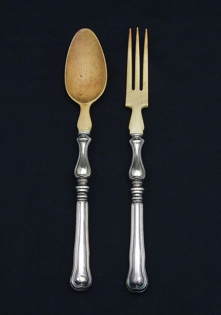 CHRISTOFLE STERLING SALAD SET: CHRISTOFLE STERLING SALAD SET: Early Christofle Sterling salad set, having Sterling handles that bare impressed Christofle marks. Attached carved spoon & fork. Both reside in original presentation box