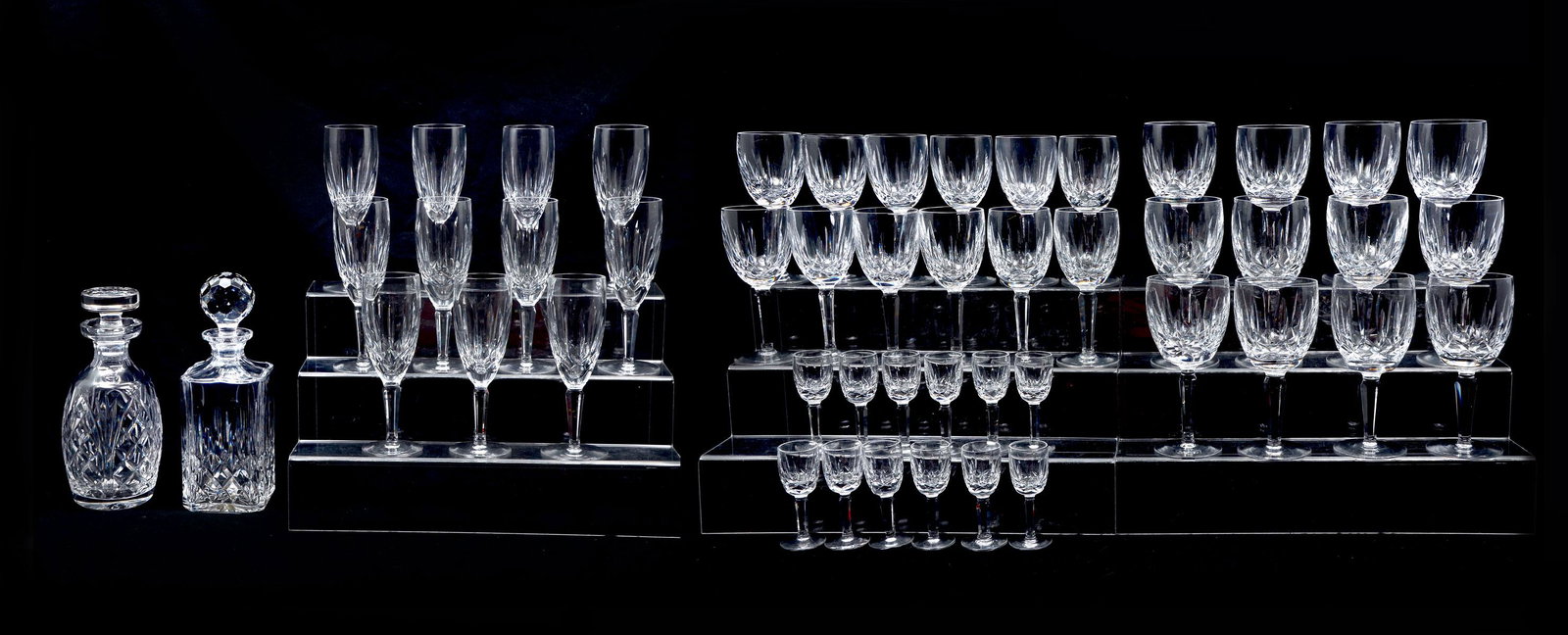 LARGE WATERFORD COLLECTION: LARGE WATERFORD COLLECTION: Comprising; 12- Wine glasses, 24- wine glasses, 12- wine flutes, 11- cordials, & 2- decanters. Largest Approx. 9.5" h x 4" w.