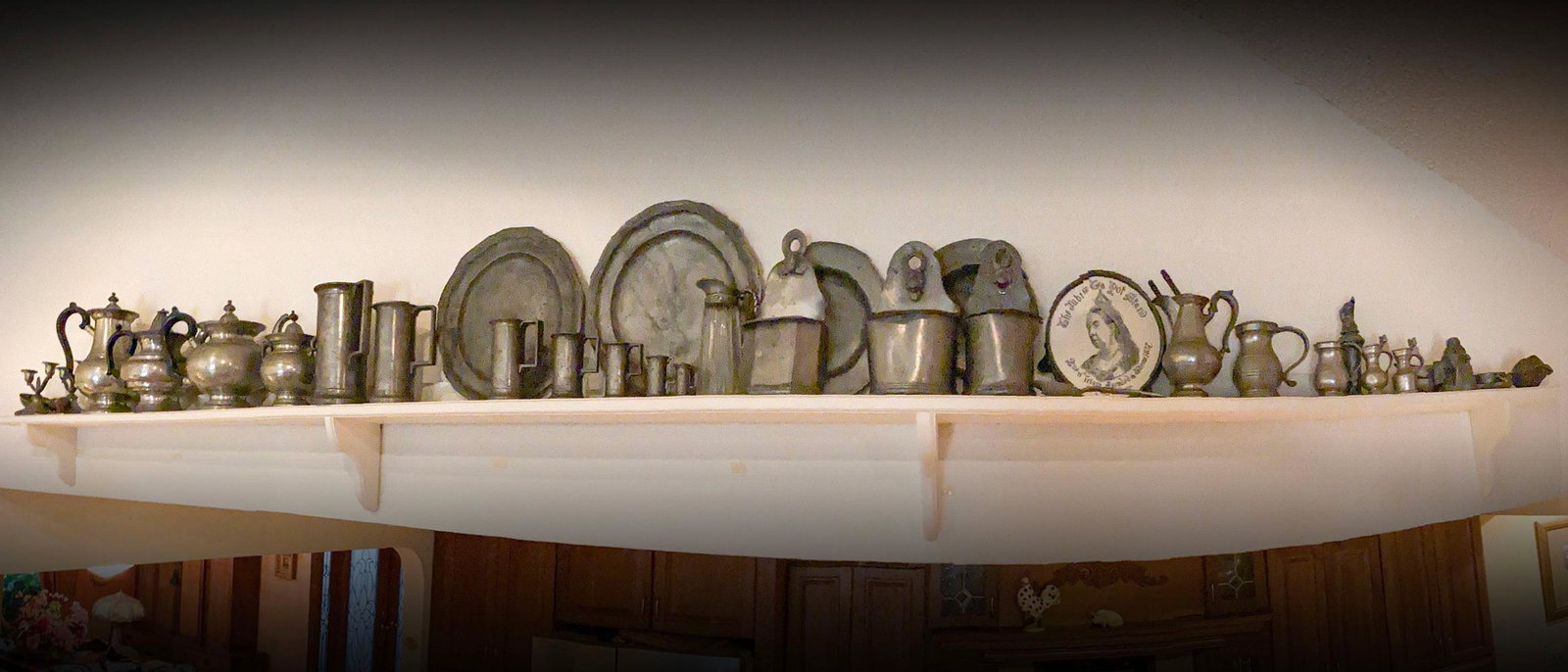 LARGE PEWTER TABLEWARE COLLECTION: LARGE PEWTER TABLEWARE COLLECTION: Including: Graduated Steins, Coffee pots, Tea pots, Plates, Water pitcher, Salt box, spoons, a Queen Victoria Jubilee Tea Pot stand, and more. Largest Approx. 10" h 