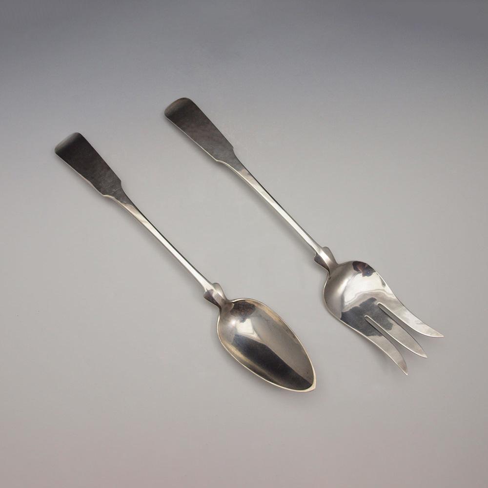 PORTER BLANCHARD STERLING SERVING FORK & SPOON: PORTER BLANCHARD STERLING SERVING FORK & SPOON: Approx. 9.3 Troy ounces. Marked Porter Blanchard Sterling Handmade to include 1) Large serving fork with attached rest, 13'' l. 2) Large serving spoon w