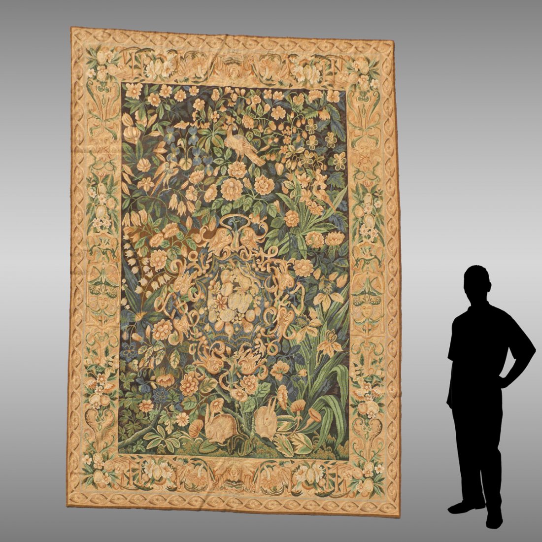 LARGE AUBUSSON STYLE FIGURAL TAPESTRY: LARGE AUBUSSON STYLE FIGURAL TAPESTRY: Large Aubusson style tapestry, having a central fruit medallion with an encompassing birds amongst blossoming foliate design. Border has a scrolling foliate & Ma