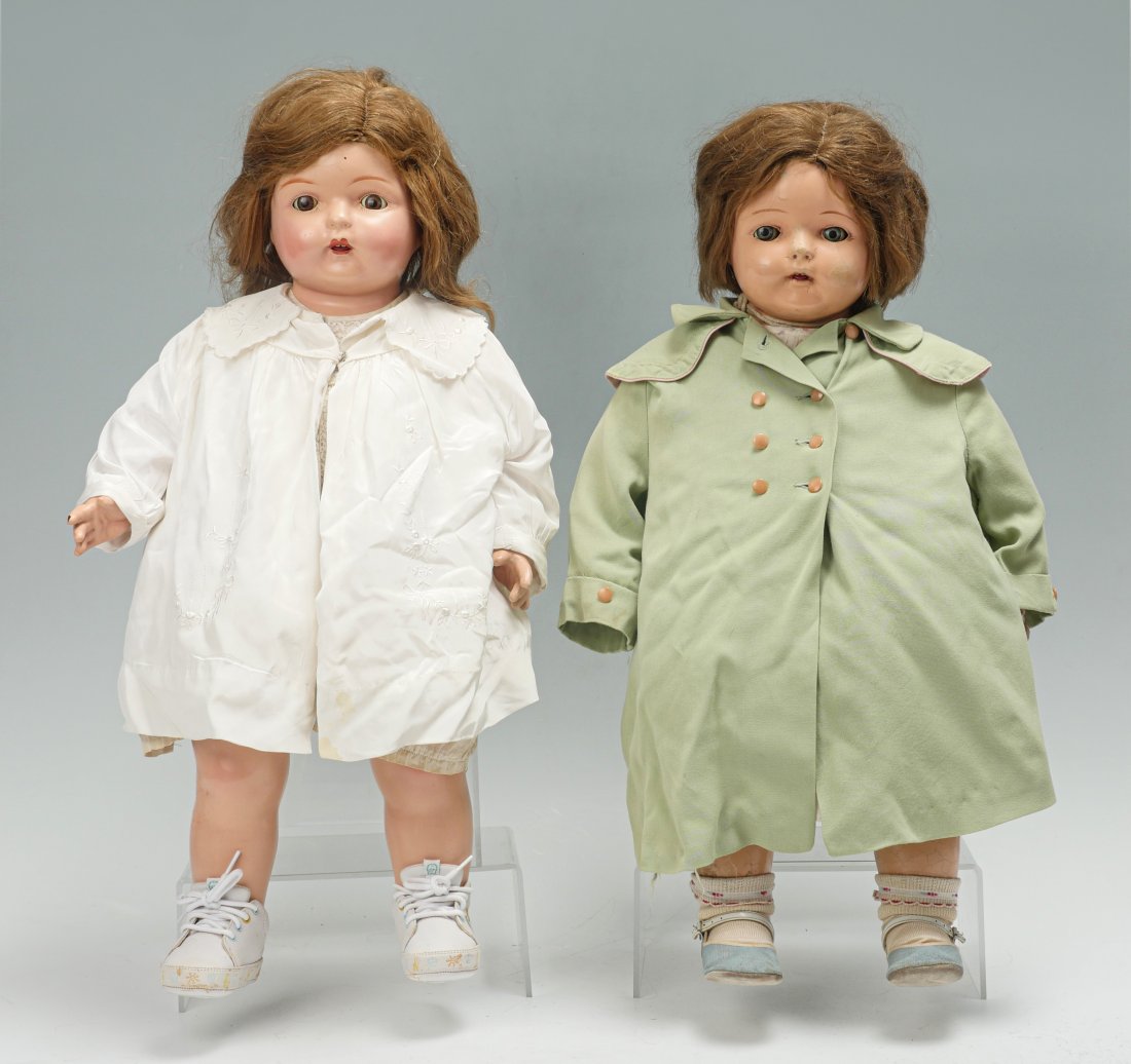 2 MADAME HENDREN DOLLY-REKORD PHONOGRAPH DOLLS: 2 MADAME HENDREN DOLLY-REKORD PHONOGRAPH DOLLS: Girl Doll with white dress features the Avril Manufacturing Co Phonograph in her chest. Dolll in green fess show evidence of once having a phonograph bu