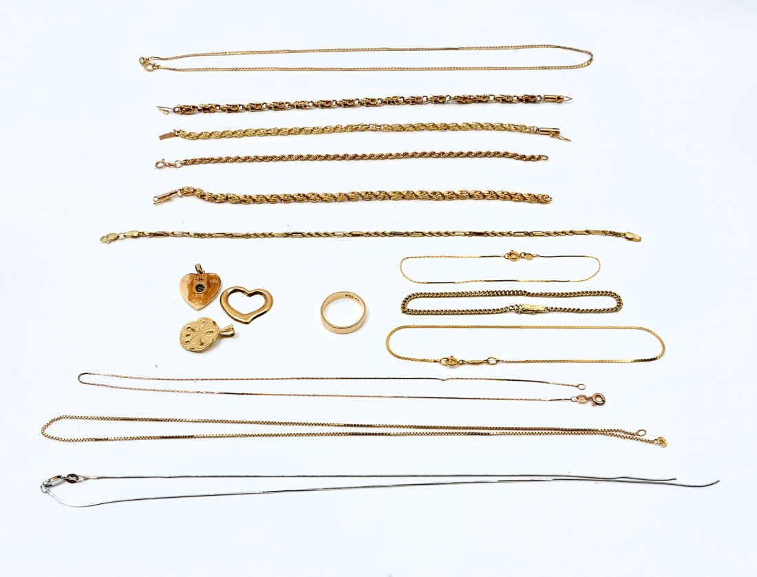 MISC LOT OF GOLD CHAINS, BRACELETS & CHARMS: MISC LOT OF GOLD CHAINS, BRACELETS & CHARMS: 48.3 grams of yellow gold jewelry including. 1) 3 necklaces; 2) 1 band; 3) 3 charms; 4) 7 bracelets. 1 fine 18K white gold necklace and 1 fine 10K bracelet