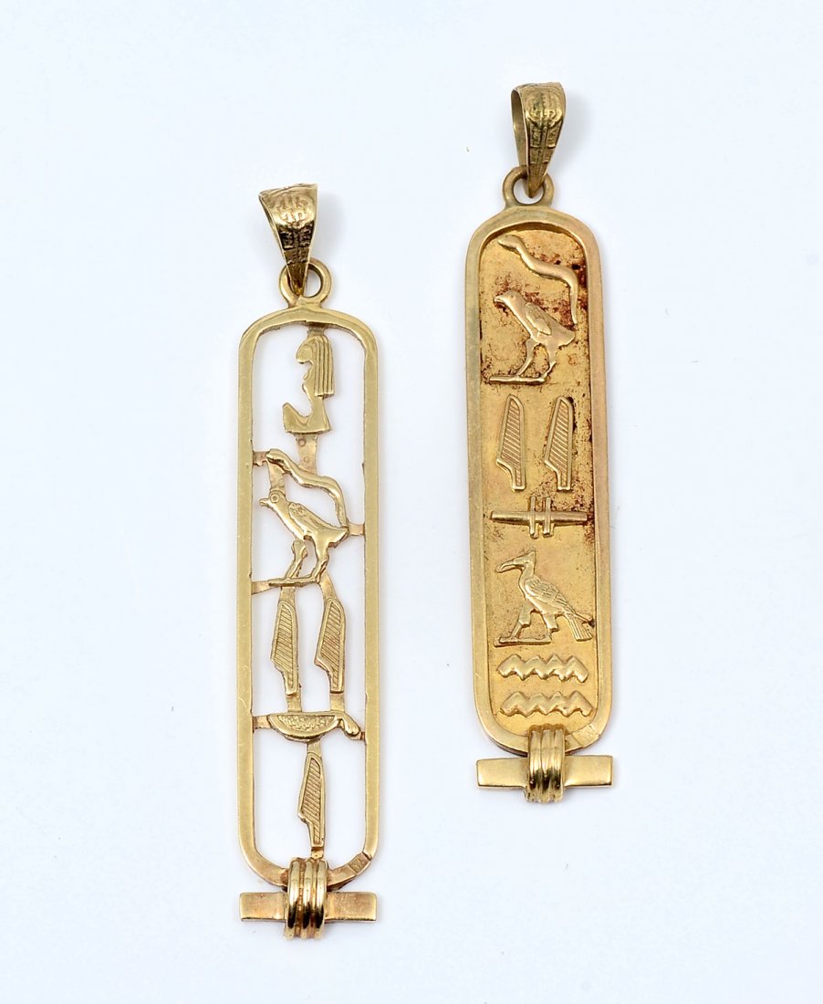 TWO 14K CARTOUCHE PENDANTS: TWO 14K CARTOUCHE PENDANTS: 1 solid and 1 cut out cartouche pendants. Total weight 7.2 grams.