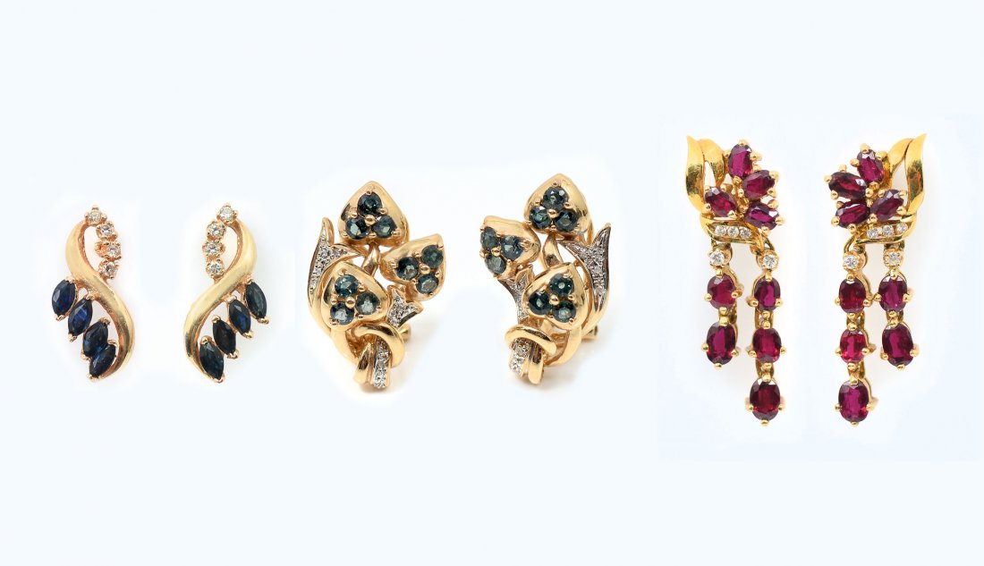 LOT OF 3 PAIR GEMSTONE EARRINGS: LOT OF 3 PAIR GEMSTONE EARRINGS: Lot of 3 pair 14K yellow gold earrings contain faceted sapphire and rubies. WEIGHT: 5.00 Ct. Round single cut and brilliant cut diamonds. WEIGHT: .25 Ct. Approx. Rated