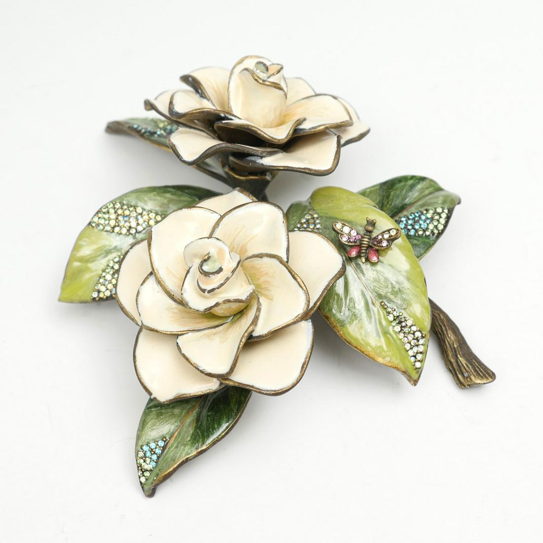 JAY STRONGWATER GARDENIA IN ORIGINAL BOX: JAY STRONGWATER GARDENIA IN ORIGINAL BOX: Jay Strongwater gorgeous gardenia flower figurine is like new. No missing crystals or chipped enamel. Swarovski crystals throughout the leaves with off white 